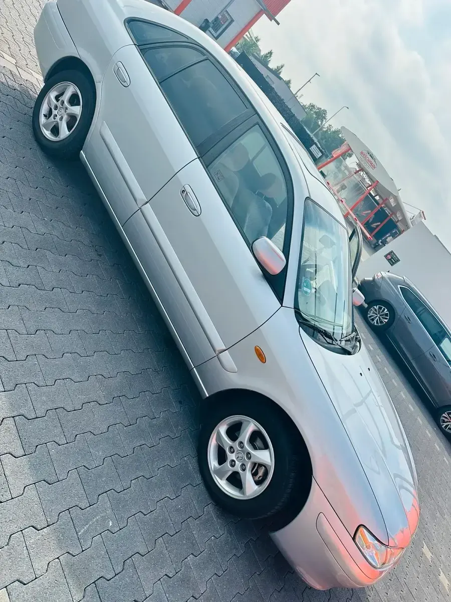 Second-hand Mazda 626 116 CP (85 kW) 2000 Argintiu Berlinǎ