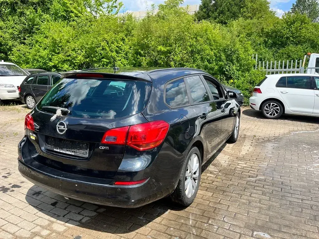 Gebraucht Opel Astra 125 PS (91 kW) 2012 Schwarz Kombi