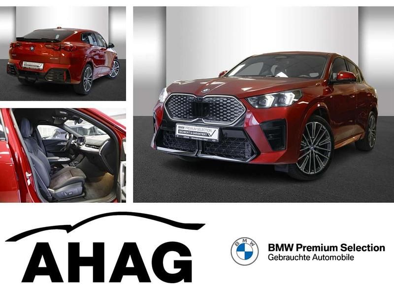 Fire red metallic Gebraucht 2024 BMW iX2 SUV | 49.940 € (Superpreis) - Bild 1/4