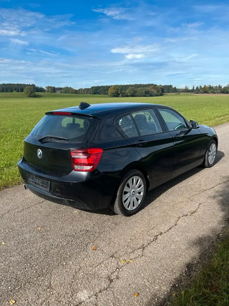 Second-hand BMW 116 136 CP (100 kW) 2011 Negru Hatchback