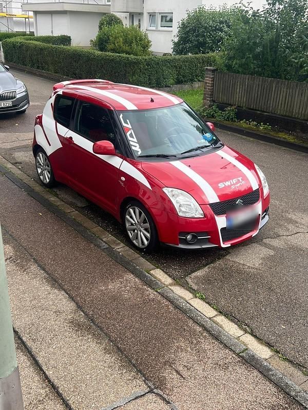 Rot Gebraucht 2007 Suzuki Swift Coupé | 4.700 € (Fairer Preis) - Bild 1/4
