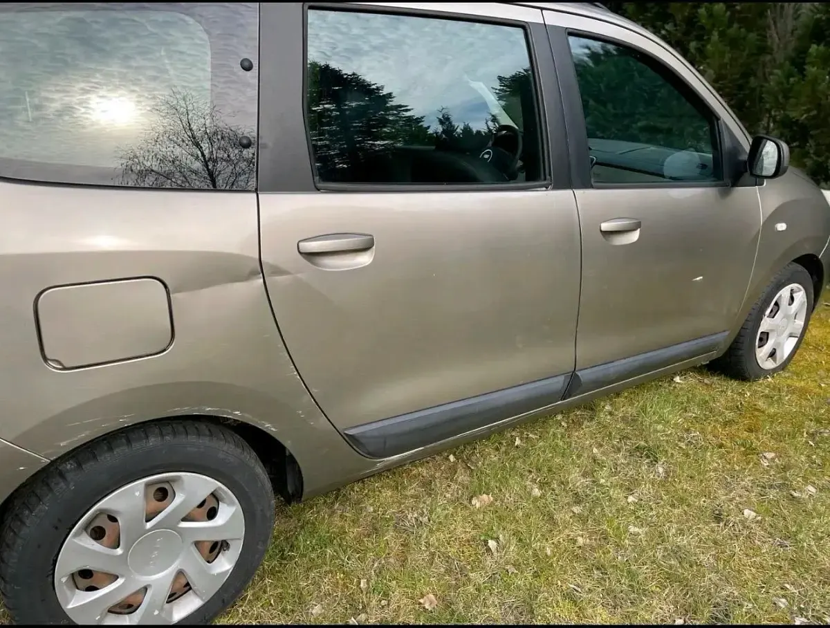 Używany Dacia Lodgy 90 KM (66 kW) 2013 Szary Minivan