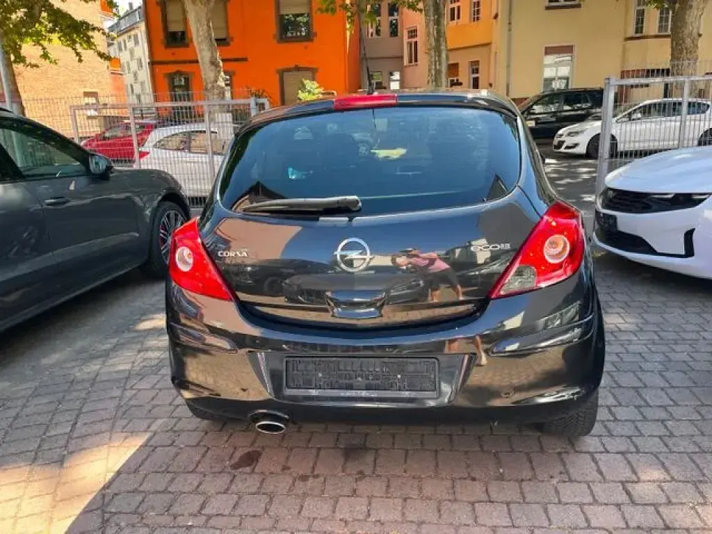 Gebraucht Opel Corsa 69 PS (50 kW) 2012 Graphitschwarz/carbon flash/midn (metallic) Kleinwagen