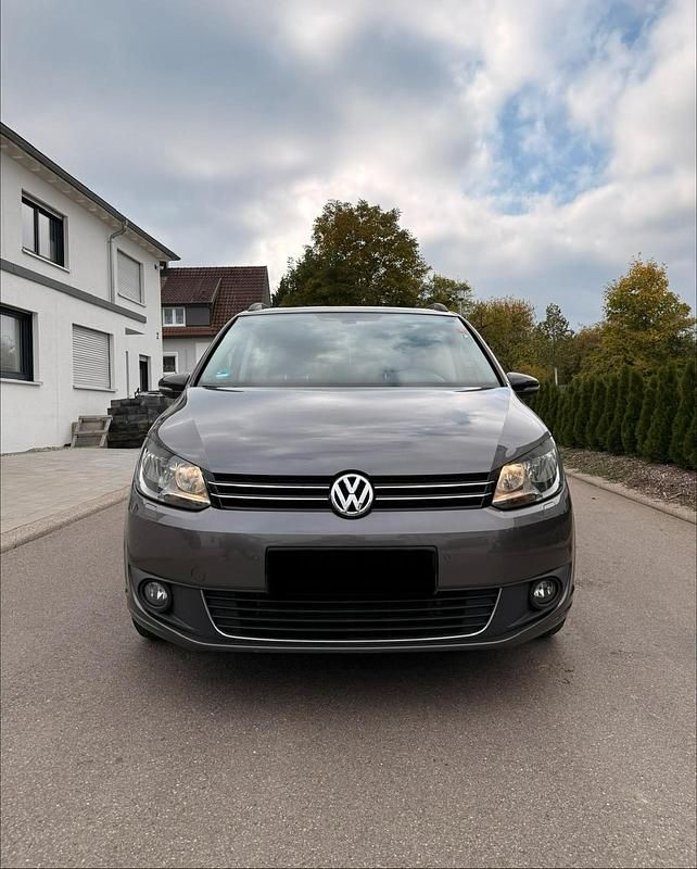 Grau Gebraucht 2012 VW Touran Match Van / Kleinbus | 7.150 € (Guter Preis) - Bild 1/4