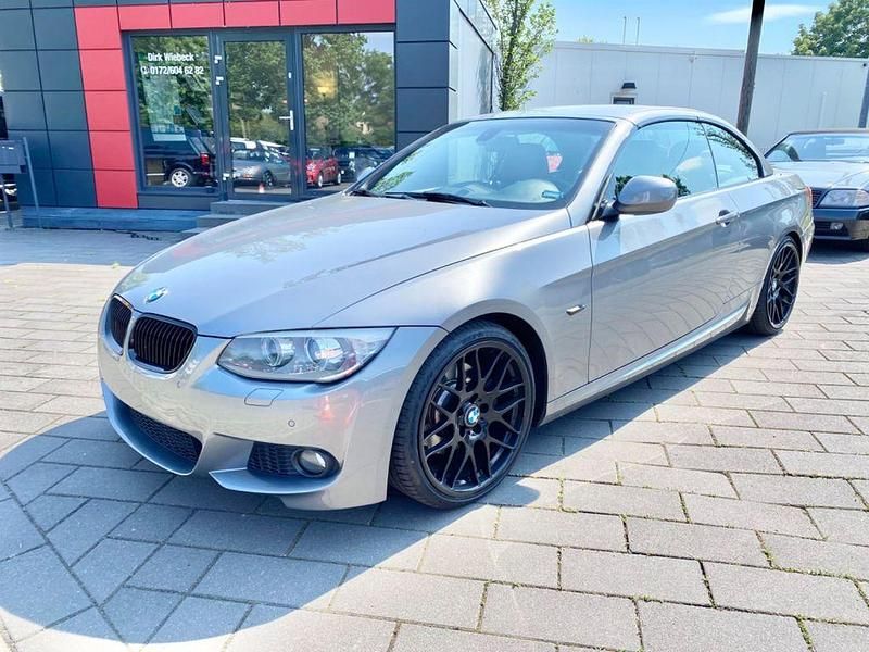 Grau Gebraucht 2011 BMW 325 Cabriolet M Sport Cabrio | 11.399 € (Guter Preis) - Bild 1/4