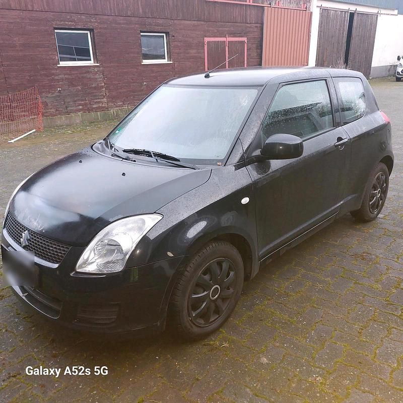 Gebraucht Suzuki Swift 90 PS (66 kW) 2012 Schwarz Kleinwagen