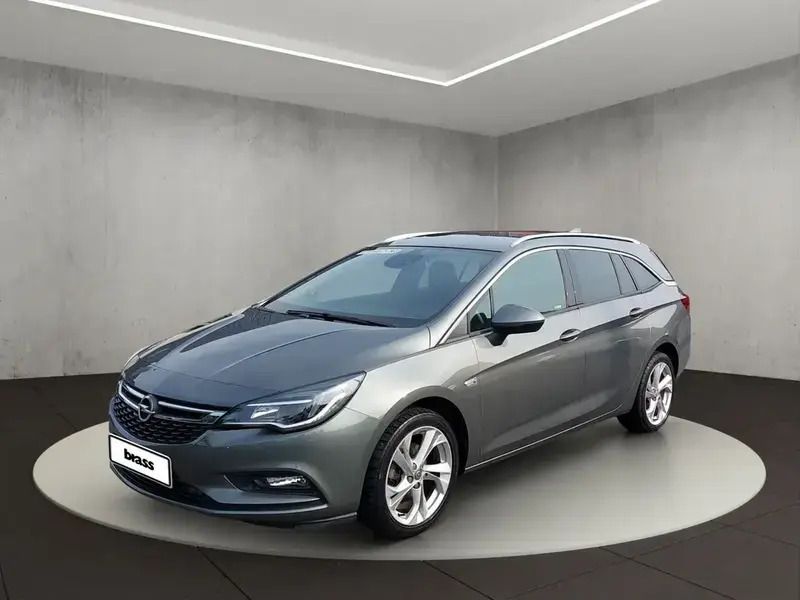 Quarz grau (perleffekt) Gebraucht 2018 Opel Astra Dynamic Kombi | 11.450 € (Fairer Preis) - Bild 1/4