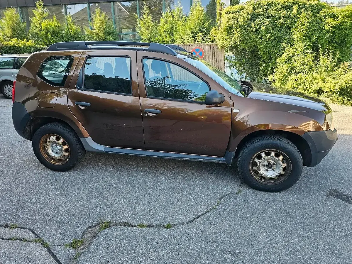 Gebraucht Dacia Duster 105 PS (77 kW) 2012 Braun SUV