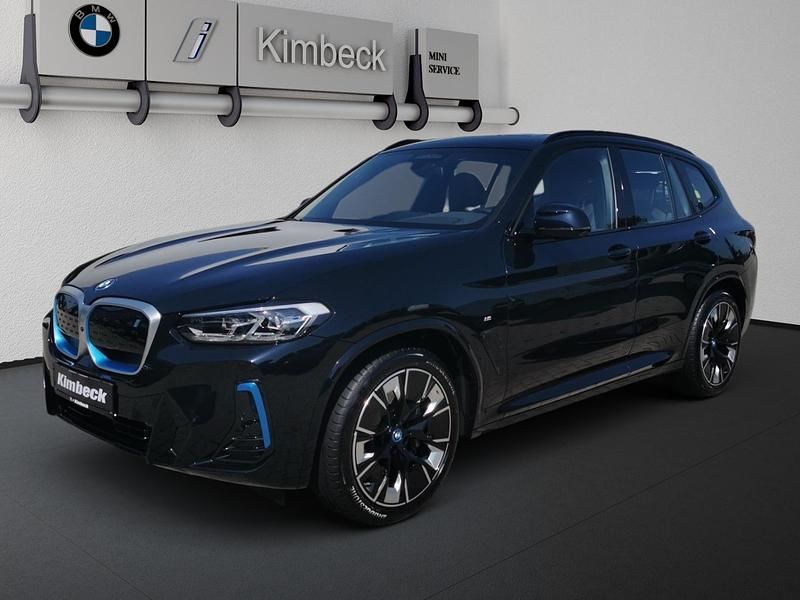 M carbonschwarz Gebraucht 2025 BMW iX3 M Sport SUV | 58.490 € (Fairer Preis) - Bild 1/4