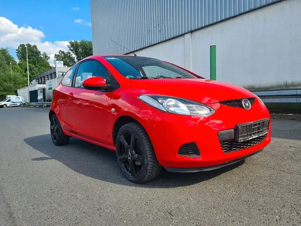 Gebraucht Mazda 2 Inclusive 86 PS (63 kW) 2009 Rot Kleinwagen