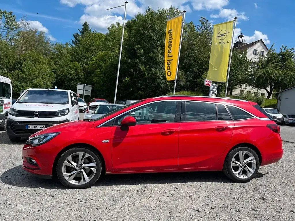Gebraucht Opel Astra Dynamic 160 PS (117 kW) 2016 Powerrot/red (metallic) Kombi