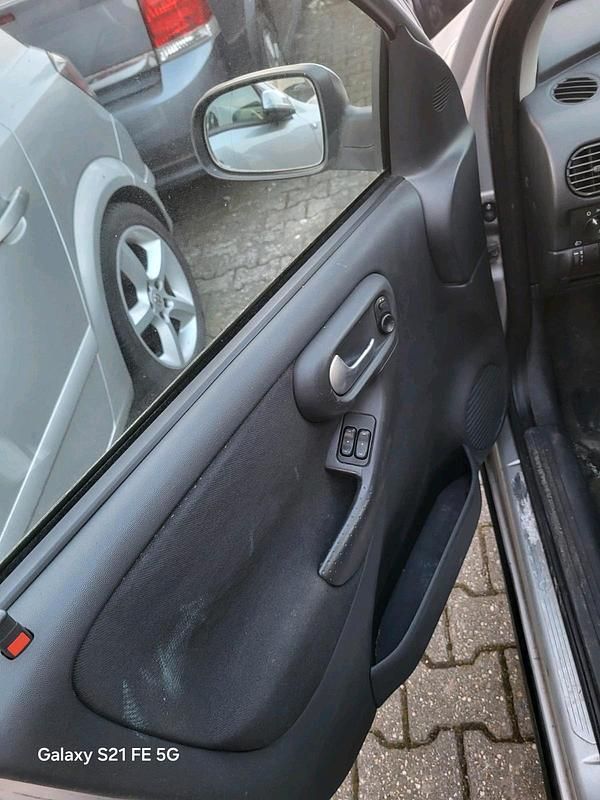 Gebraucht Opel Corsa 80 PS (58 kW) 2006 Silber Kleinwagen