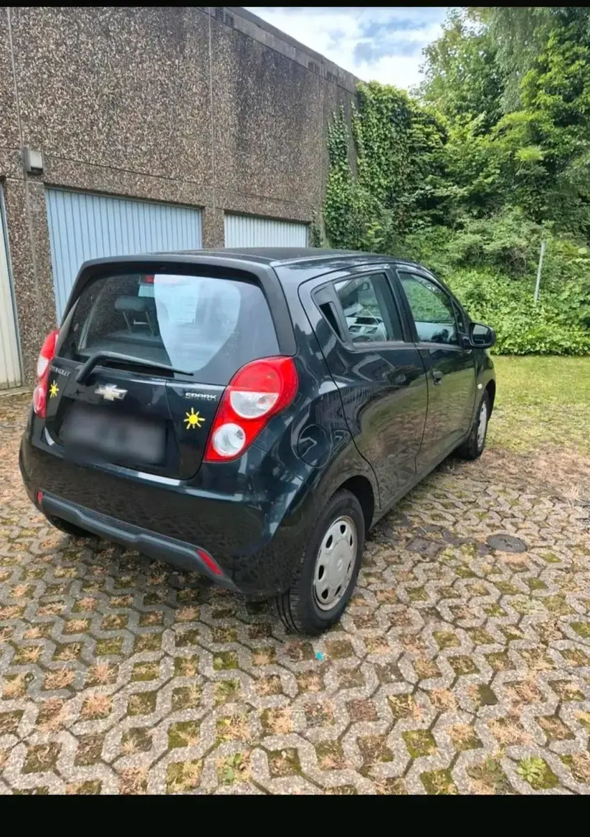 Gebraucht Chevrolet Spark 68 PS (50 kW) 2013 Schwarz Kleinwagen