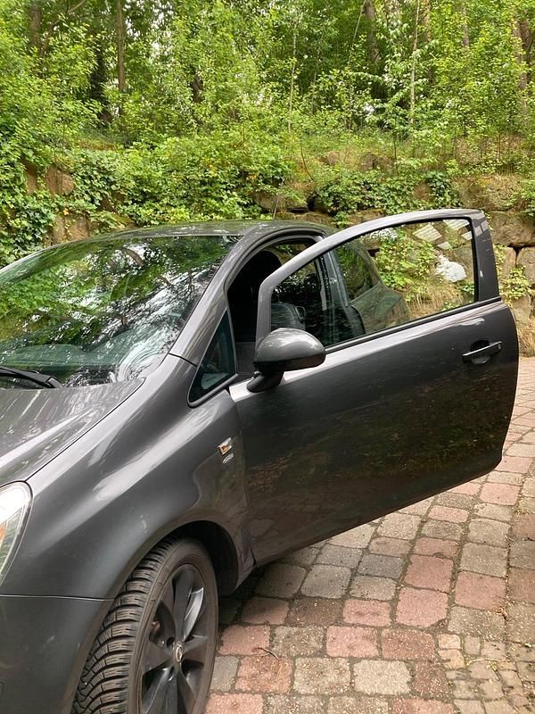 Gebraucht Opel Corsa 69 PS (50 kW) 2011 Grau Kleinwagen