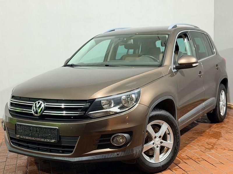 Braun Gebraucht 2012 VW Tiguan Sportline SUV | 10.990 € (Fairer Preis) - Bild 1/4