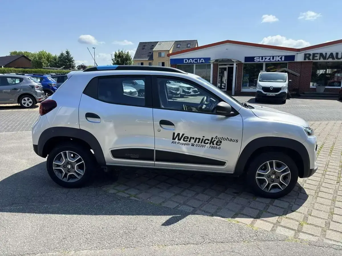 Gebraucht Dacia Spring Comfort 33 kW (45 PS) 2021 Diamantsilbergrau Kleinwagen