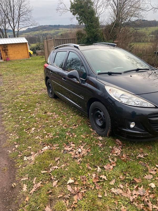 Gebraucht Peugeot 207 95 PS (69 kW) 2011 Schwarz Kombi