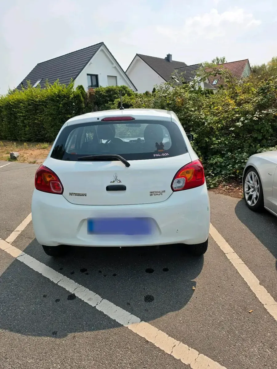 Gebraucht Mitsubishi Space Star 71 PS (52 kW) 2015 Weiß Kleinwagen