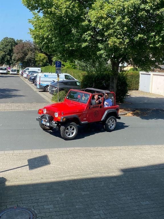 Rot Gebraucht 1997 Jeep Wrangler Sport SUV | 14.500 € (Fairer Preis) - Bild 1/4