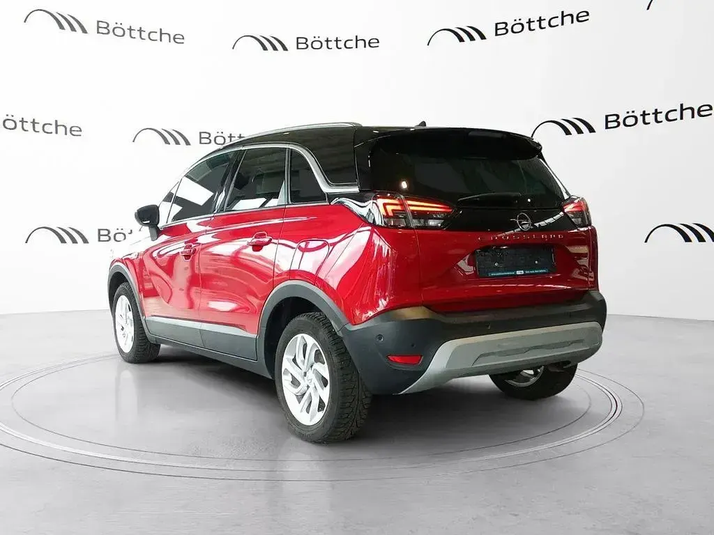Gebraucht Opel Crossland Ultimate 131 PS (96 kW) 2024 Lackierung peperoncino red/met SUV
