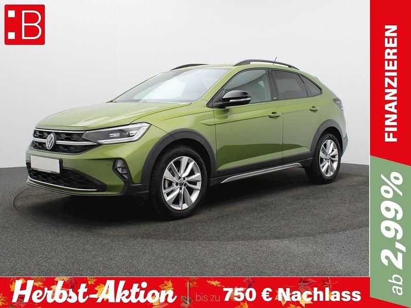 Gruen Gebraucht 2024 VW Taigo Move SUV | 21.950 € (Guter Preis) - Bild 1/4