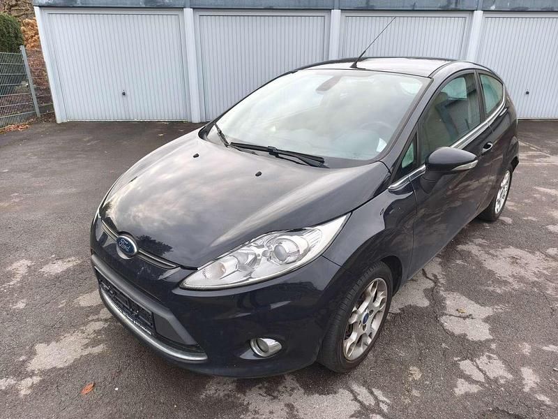 Gebraucht Ford Fiesta Titanium 95 PS (69 kW) 2011 Pantherschwarz metallic Kleinwagen