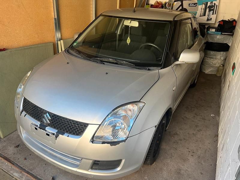 Gebraucht Suzuki Swift 94 PS (69 kW) 2010 Grau Kleinwagen