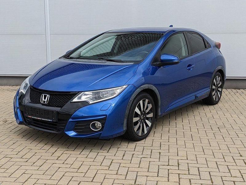 Brilliant sporty blue metallic (metallic) Gebraucht 2015 Honda Civic Elegance Limousine | 11.880 € (Fairer Preis) - Bild 1/4