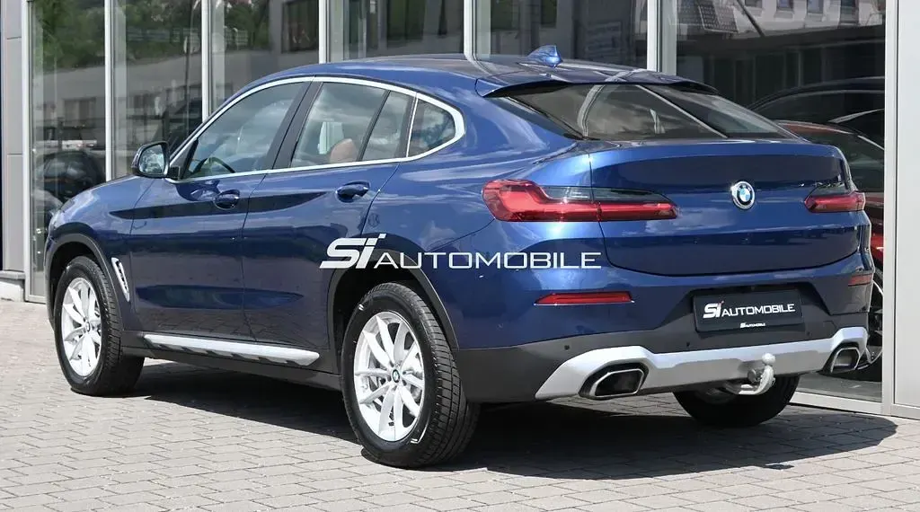 Gebraucht BMW X4 Performance 286 PS (210 kW) 2024 Phytonicblau metallic SUV