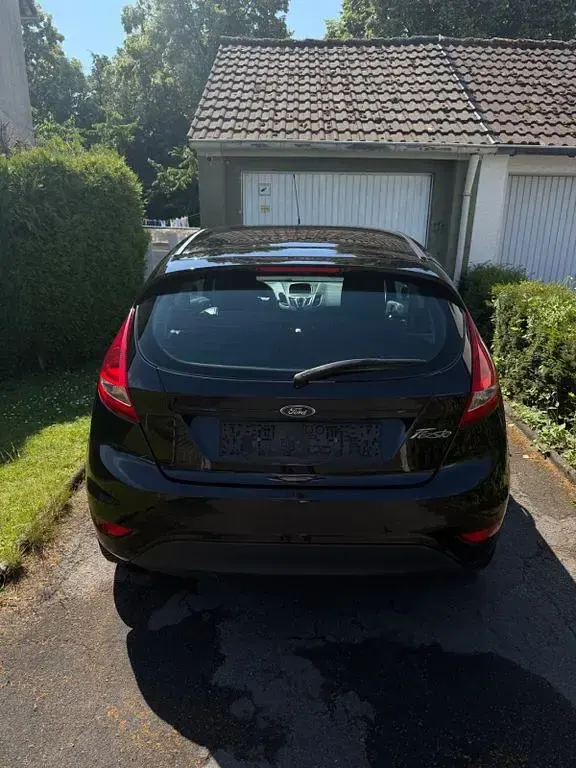 Gebraucht Ford Fiesta 60 PS (44 kW) 2009 Schwarz Limousine