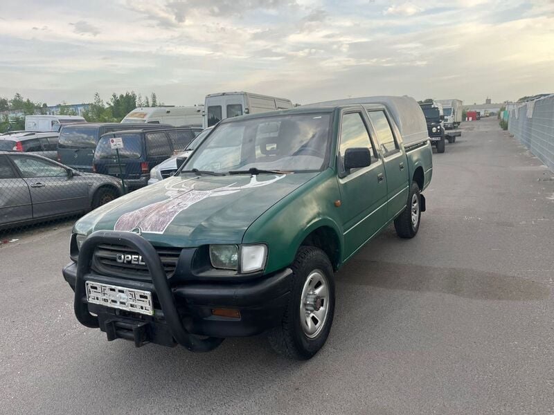 Grün Gebraucht 1999 Opel Campo Abholung | 3.499 € - Bild 1/4
