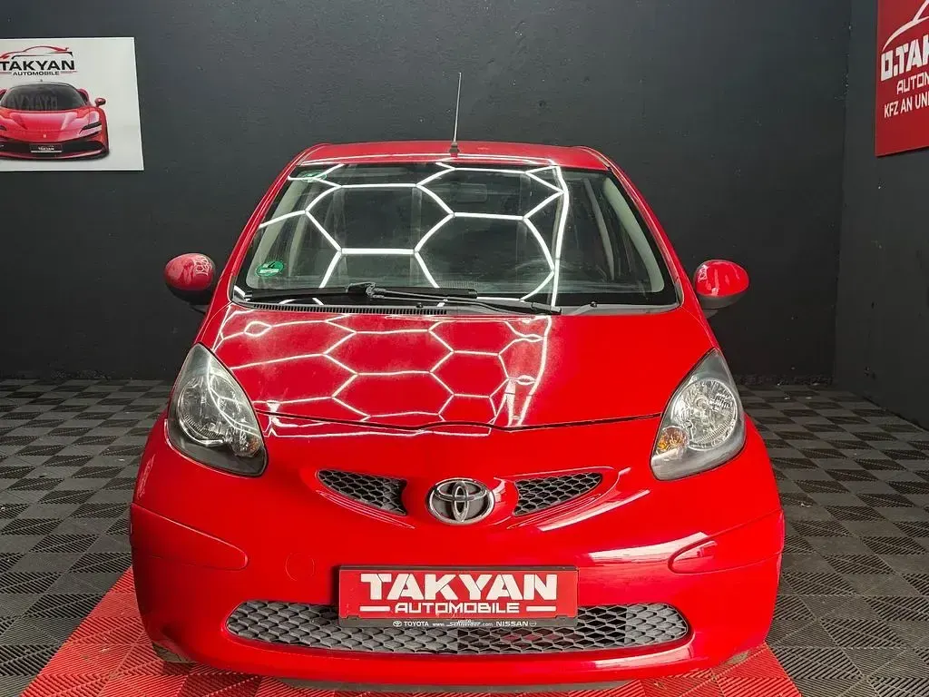 Używany Toyota Aygo Cool 68 KM (50 kW) 2009 Czerwony Hatchback