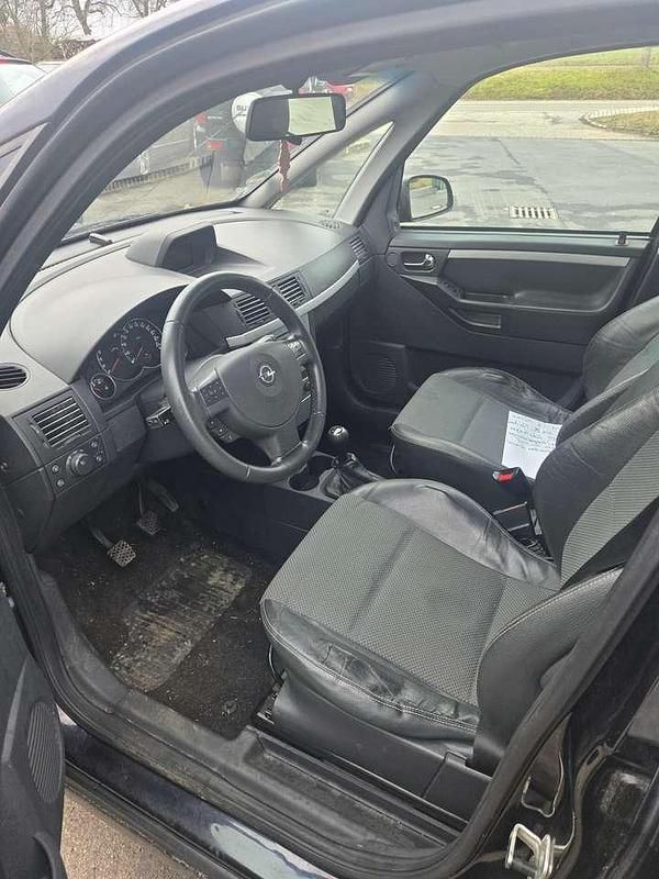 Gebraucht Opel Meriva 105 PS (77 kW) 2009 Schwarz Van / Kleinbus