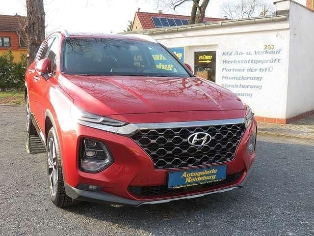 Magma red / mic Gebraucht 2020 Hyundai Grand Santa Fe Premium SUV | 29.340 € (Fairer Preis) - Bild 1/4