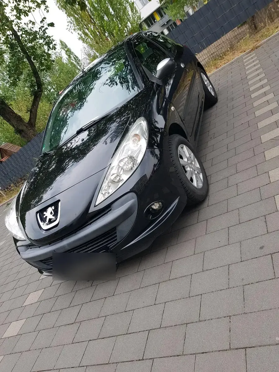 Gebraucht Peugeot 206+ 75 PS (55 kW) 2009 Schwarz Kleinwagen