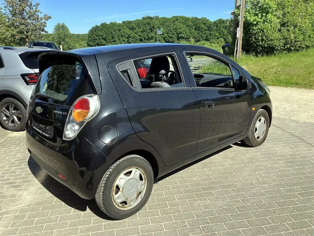 Używany Chevrolet Spark LS 68 KM (50 kW) 2011 Czarny Hatchback