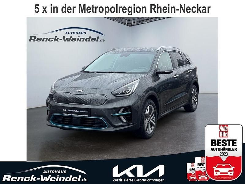Agt) interstellar grau met. (grau Gebraucht 2021 Kia e-Niro Spirit SUV | 24.889 € (Fairer Preis) - Bild 1/4