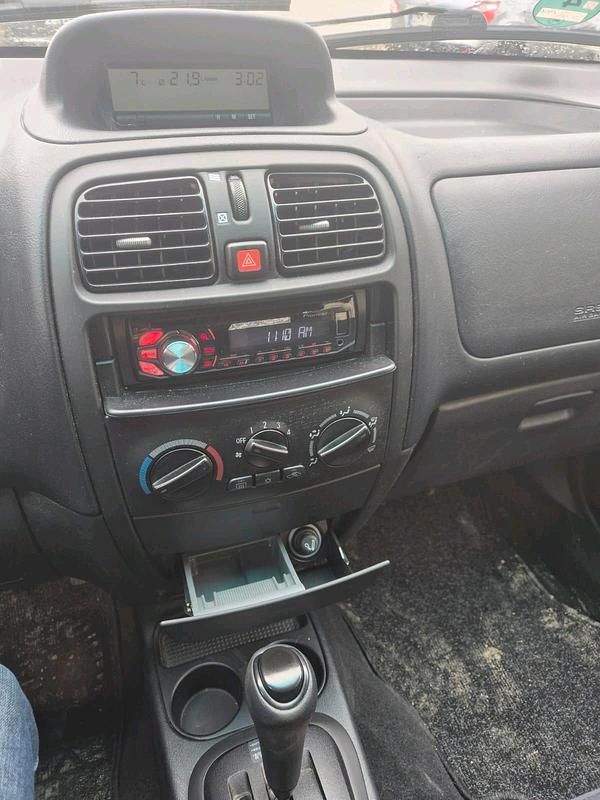 Gebraucht Mitsubishi Space Star 98 PS (72 kW) 2004 Grau Van / Kleinbus