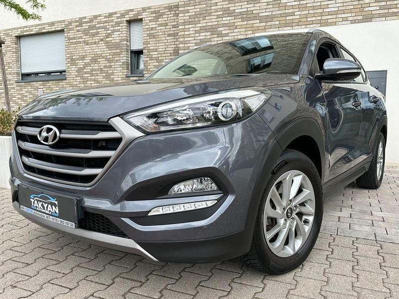 Grau Gebraucht 2016 Hyundai Tucson Intro Edition SUV | 14.990 € (Guter Preis) - Bild 1/4