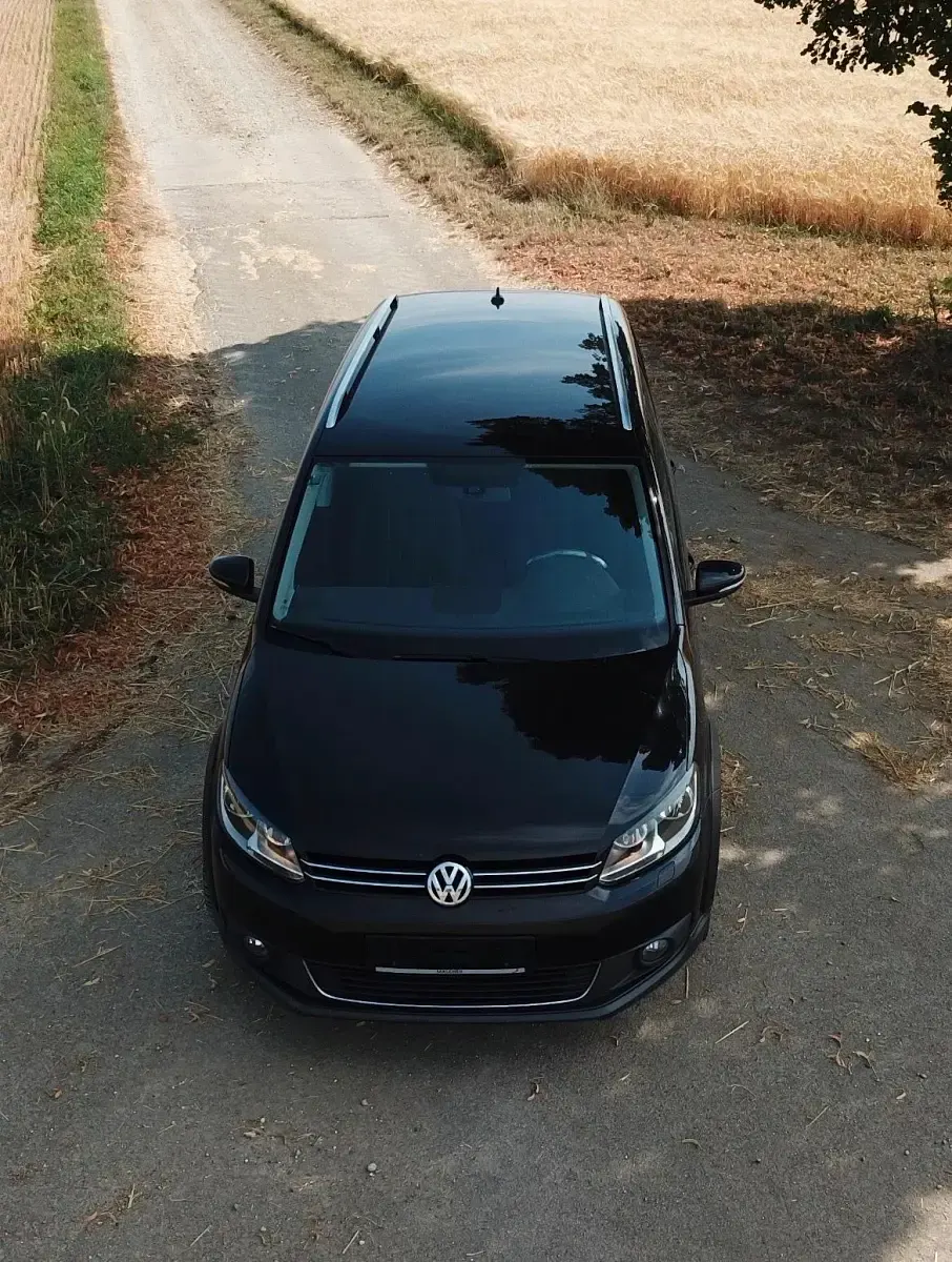 Gebraucht VW Touran Cross 140 PS (102 kW) 2011 Schwarz Van / Kleinbus