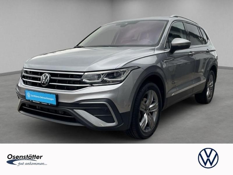 Pyritsilber metallic (metallic) Gebraucht 2024 VW Tiguan Allspace Life SUV | 36.540 € (Guter Preis) - Bild 1/4