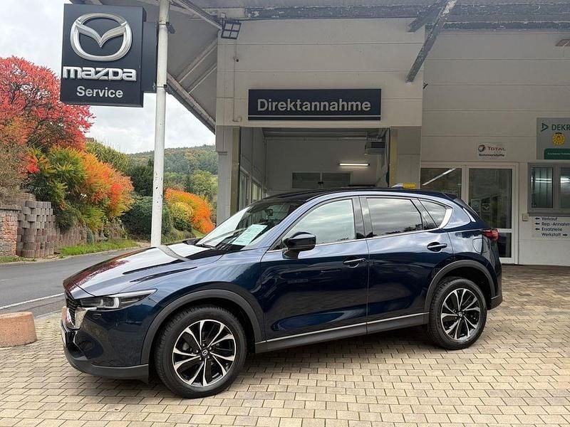 Deep crystal blue Gebraucht 2022 Mazda CX-5 Sports-Line SUV | 28.450 € (Guter Preis) - Bild 1/4