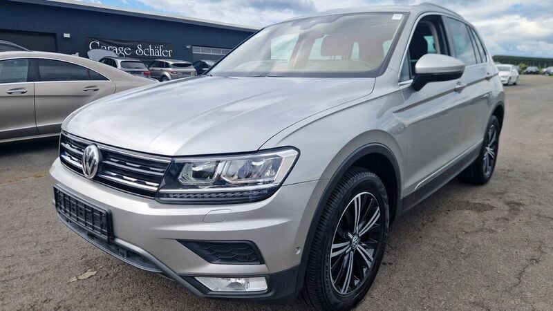 Tungsten silver metallic Gebraucht 2016 VW Tiguan Highline SUV | 22.499 € (Guter Preis) - Bild 1/4