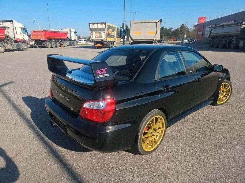 Schwarz Gebraucht 2003 Subaru Impreza Limousine | 16.490 € (Superpreis) - Bild 1/4