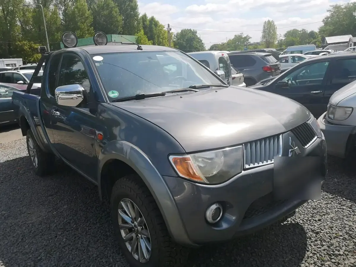 Gebraucht Mitsubishi L200 136 PS (100 kW) 2006 Grau Pickup