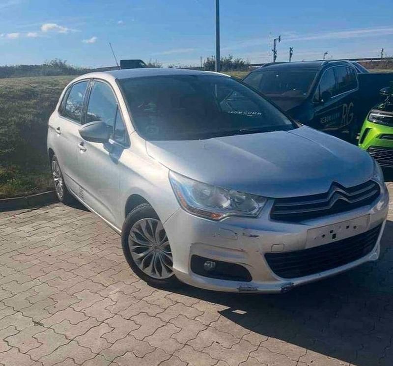 Grau Gebraucht 2013 Citroën C4 Tendance Limousine | 3.375 € (Superpreis) - Bild 1/4