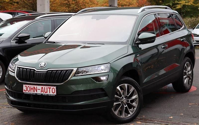 Zelena emerald/emerald green Gebraucht 2021 Skoda Karoq Clever SUV | 24.900 € (Fairer Preis) - Bild 1/4