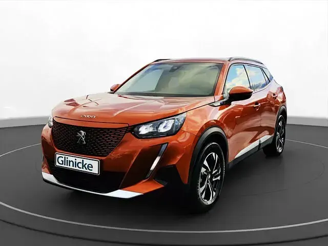 Gebraucht Peugeot e-2008 Allure 100 kW (136 PS) 2022 Metfa orange fusion SUV