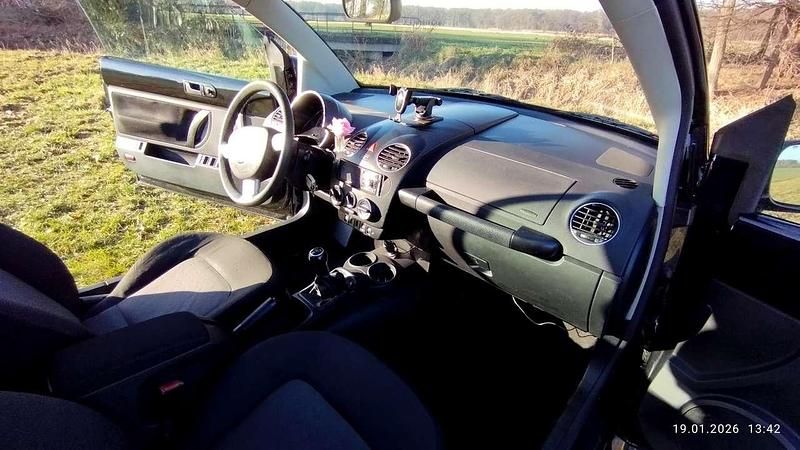 Gebraucht VW New Beetle 102 PS (75 kW) 2007 Schwarz Kleinwagen