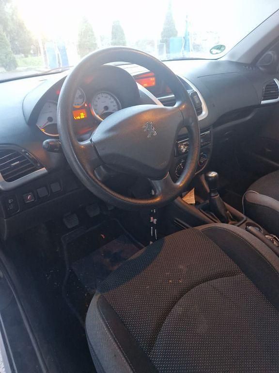 Gebraucht Peugeot 206 75 PS (55 kW) 2010 Schwarz Limousine